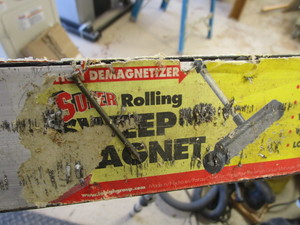 lot 99 image: Rolling sweep magnet with magnet in...