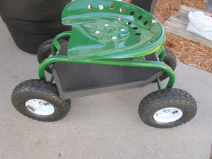 lot 206 image: John Deere green garden scooter...