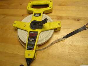 lot 217 image: Empire fiberglass 100ft tape...