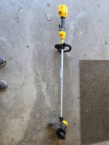 lot 26 image: DeWalt Cordless String Trimmer with Adjustable Handle