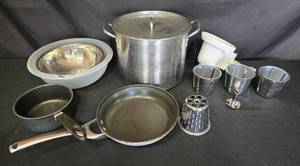 lot 46 image: Stainless Steel Cookware Set with KitchenAid Rotor SlicerShredder Attachment