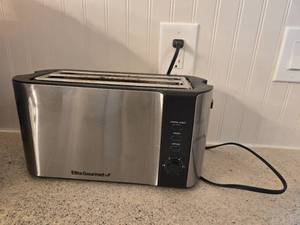 lot 111 image: Elite Gourmet Stainless Steel 4-Slice Toaster with Reheat and Defrost Functions