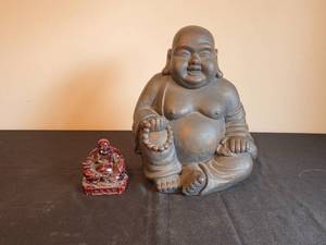 lot 132 image: Pair of Buddha Statues Large Bronze-Colored and Small Red Resin Design