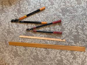 lot 146 image: Fiskars Bypass Lopper and Anvil Pruner Set with Wooden Ruler