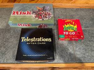lot 152 image: Collection of 3 Board Games Telestrations After Dark, Risk, Apples to Apples To Go