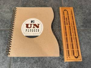 lot 158 image: MTV Unplugged Spiral Notebook and Hoyle Continuous-Track Cribbage Board