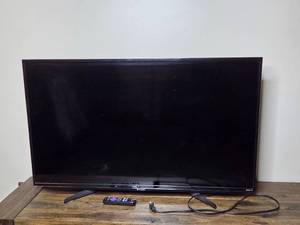 lot 176 image: 42-inch Sharp LED TV with Remote