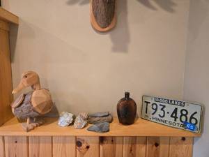 lot 182 image: Vintage Wooden Duck, Antique Bottle, and Minnesota License Plate Collection