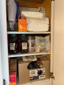 lot 201 image: Assorted Household Items Including Organic Honey, Coffee Pods, and Compostable Bags