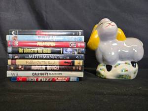 lot 211 image: DVDs and a Decorative Ceramic Sheep Figurine