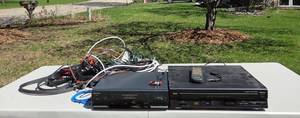 lot 237 image: RCA 5 Disc Changer and Quasar VCR with Remote & Assorted Cables
