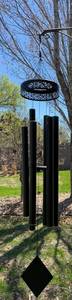 lot 257 image: Large Outdoor Metal Wind Chime with Elegant Design