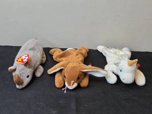 lot 29 image: Set of 3 Ty Beanie Babies - Mystic the Unicorn, Ears the Bunny, and Spike the Rhino