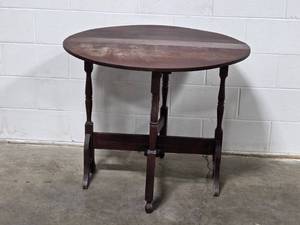 lot 41 image: Antique Oval Wooden Drop-Leaf Table