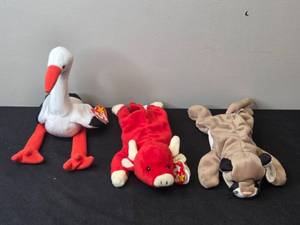 lot 46 image: Set of 3 Beanie Babies Stilts, Snort, and Canyon the Lion