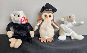 lot 49 image: Set of 3 Beanie Babies Wise Owl, Mooch Monkey, and Fleece Lamb