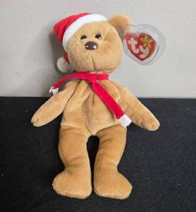 lot 65 image: 1997 Ty Beanie Baby 1997 Christmas Bear Teddy with Santa Hat