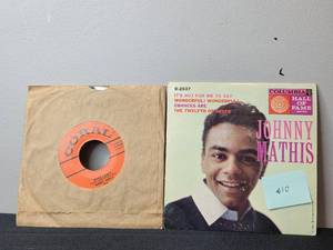lot 110 image: Johnny Mathis and Buddy Holly 45 RPM Vinyl Records