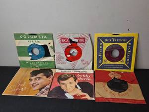 lot 112 image: Collection of Vintage 45 RPM Vinyl Records with Sleeves