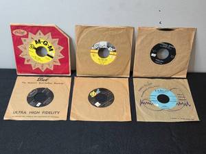 lot 147 image: Collection of Vintage 45 RPM Records with Sleeves