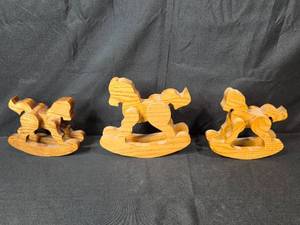 lot 233 image: Set of 3 Wooden Rocking Horse Figurines
