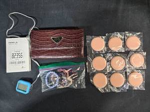 lot 242 image: Collection of Cosmetic Sponges, Bracelets, Wallet, and Pedometer