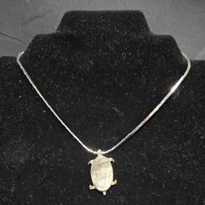 lot 268 image: Collection of Jewelry Silver Tone Turtle Stamped Mexico Necklace & Italian Coin Pendant