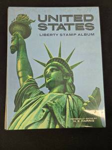 lot 282 image: United States Liberty Stamp Album Edited by H. E. Harris Inc Some Mint Stamps On a Few Pages