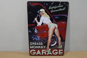 lot 149 image: Novelty Metal Sign -Grease Monkey Garage