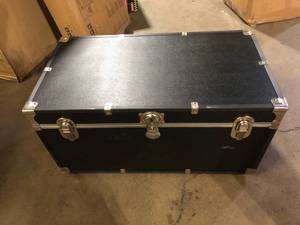 lot 27 image: Seward Trunk Seward 31 in. Trunk with Wheels and Lock, Black   Customer  Returns See Pictures