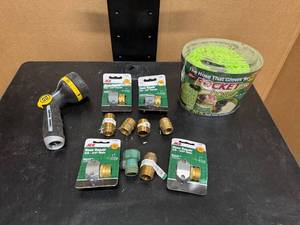 lot 94 image: Pocket Hose, Spray Nozzle and Hose Repair Kits