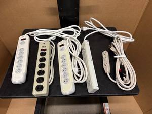 lot 95 image: Three Six-Outlet Power Strips and One Extension Cord