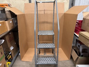 lot 8 image: Cotterman Three Step Rolling Ladder. 350 LB Capacity