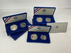 lot 11 image: 3x 1986 2pc Silver Commemorative Dollar and Clad Half Dollar