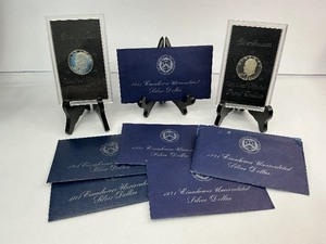 lot 36 image: 8pc Silver Ike Lot