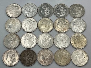 lot 38 image: 20x 1887 Solid Date Tube of Morgan Silver Dollars