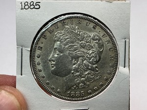lot 53 image: 1885 Morgan Silver Dollar