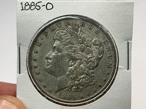 lot 54 image: 1885-O Morgan Silver Dollar