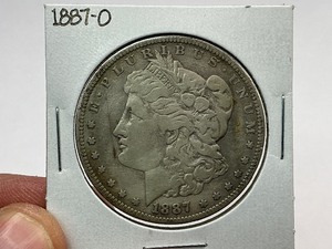 lot 57 image: 1887-O Morgan Silver Dollar