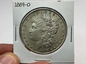 lot 61 image: 1889-O Morgan Silver Dollar