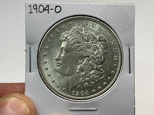 lot 83 image: 1904-O Morgan Silver Dollar