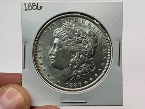lot 97 image: 1886 Morgan Silver Dollar