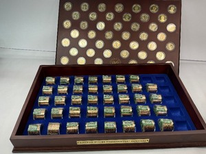 lot 87 image: 513pc Danbury Mint Presidential Dollar Collection