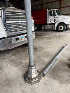 lot 17 image: Light Pole Base & 2 Poles