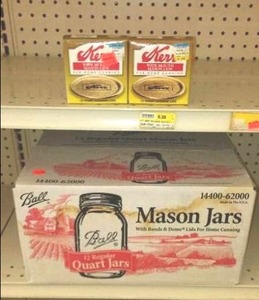 lot 94 image: Ball Reg. 1 qt. Mason Jars and Seals.
