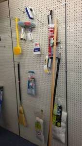lot 16 image: Broom, Mop heads, brushes, squeegee and more.