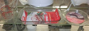 lot 100 image: Pyrex 9 x 13, 9 in. Pie plate and 2 C Measuring Cup.