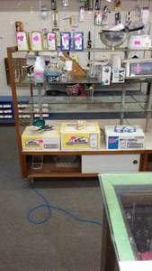 lot 133 image: Double Sided Display Shelving with Storage.