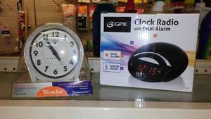 lot 140 image: GPX Clock Radio and Westclox Alarm Clock.