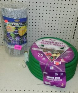 lot 262 image: 75 ft. hose, 2 ft. garden fencing.